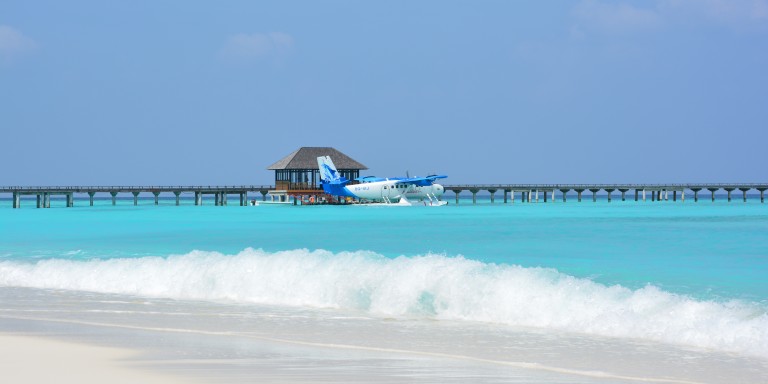 Lounge with seaplane dock - Perfect welcome in the lounge after landing with the seaplane next to the island.